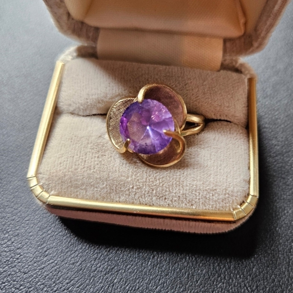 Gold Ring with Purple Gemstone